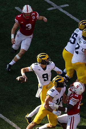 J.J. McCarthy (9), Colston Loveland (18), Zak Zinter (65), and Karsen Barnhart (52)