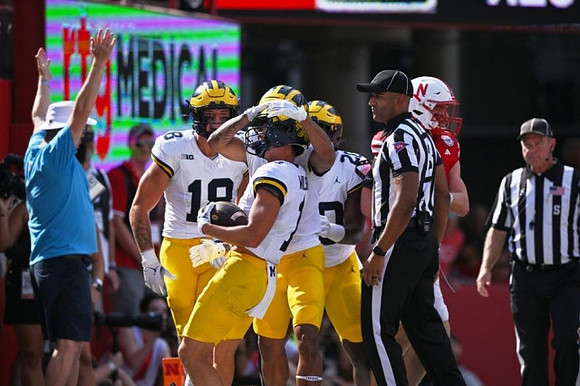 Colston Loveland (18), Roman Wilson (1), and Kalel Mullings (20)