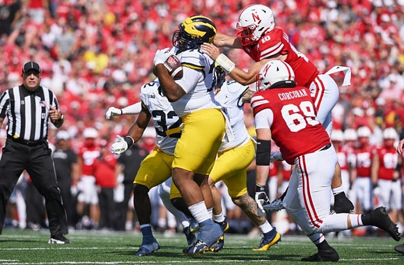 Kenneth Grant (78) and Jaylen Harrell (32)