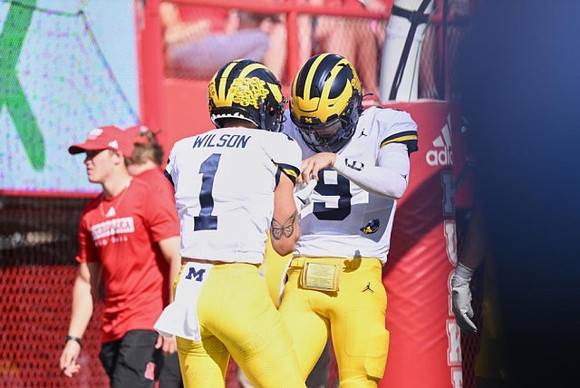 Roman Wilson (1) and J.J. McCarthy (9)
