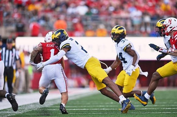Will Johnson (2) and Jaydon Hood (34)
