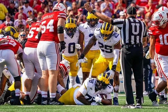 Mike Sainristil (0), Keon Sabb (3), Kenneth Grant (78), and Junior Colson (25)