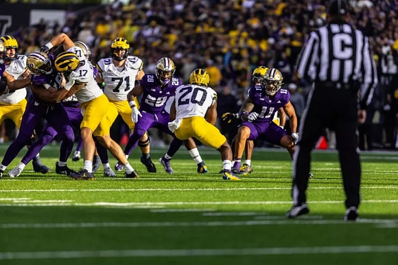 Marlin Klein (17), Evan Link (71), and Kalel Mullings (20)