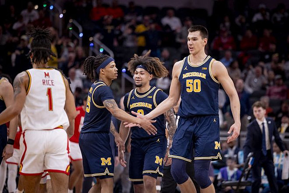 Rubin Jones (15), Tre Donaldson (3), and Vladislav Goldin (50)