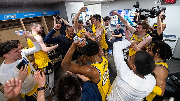 Juwan Howard and Michigan Team