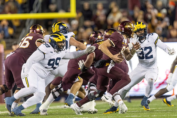 Cam Goode (99) and Jaylen Harrell (32)