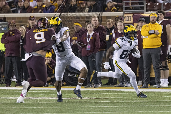 Tyler Morris (8) and Semaj Morgan (82)