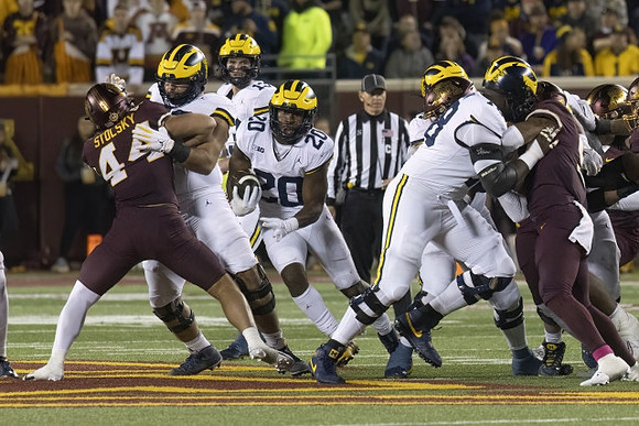 Jack Tuttle (13), Kalel Mullings (20), and Myles Hinton (78)