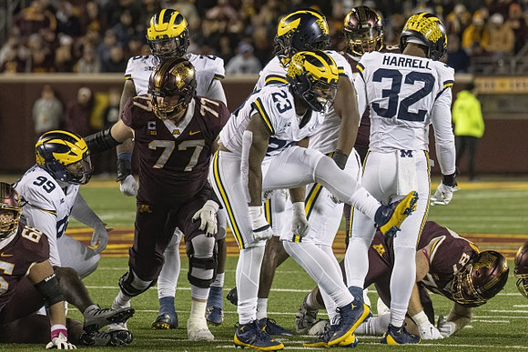 Cam Goode (99), Rayshaun Benny (26), Michael Barrett (23), and Jaylen Harrell (32)