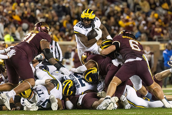 Trevor Keegan (77), LaDarius Henderson (73), and Kalel Mullings (20)