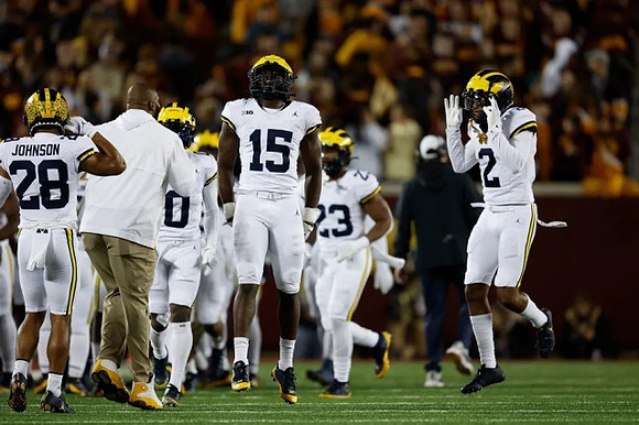 Quinten Johnson (28), Ernest Hausmann (15), Michael Barrett (23), Will Johnson (2), and Mike Sainristil (0)