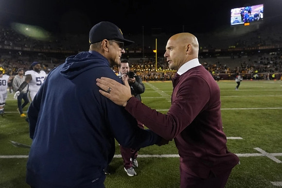 Jim Harbaugh and Minnesota Head Coach P. J. Fleck