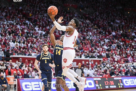 Hunter Dickinson (1) and Moussa Diabate (14)