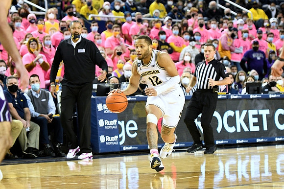 Juwan Howard and DeVante' Jones (12)