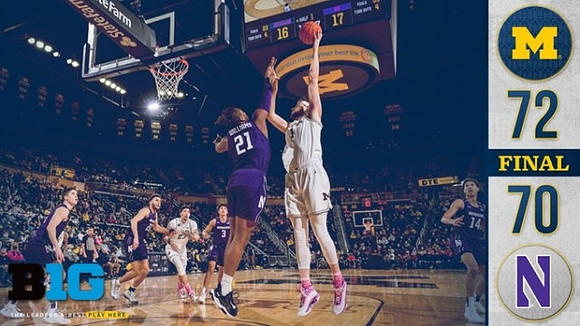 Hunter Dickinson (1) and Brandon Johns Jr. (23)
