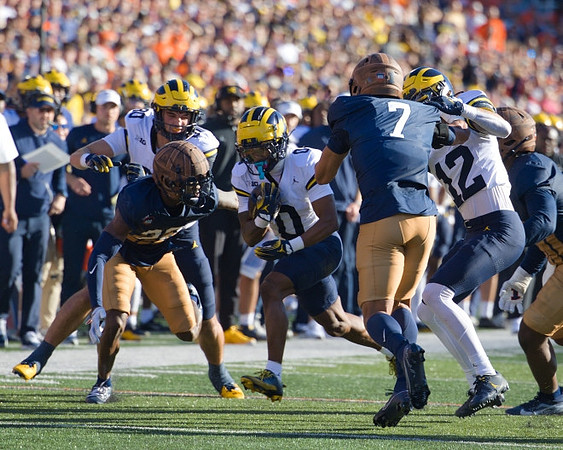 Hogan Hansen (80), Semaj Morgan (0), and Kendrick Bell (12)