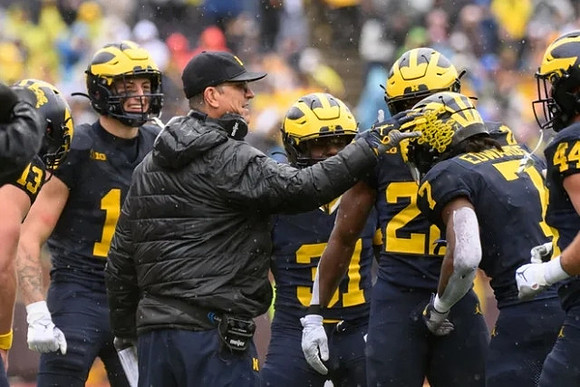 Jim Harbaugh and Michigan Team