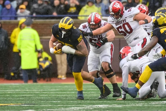 Mason Graham (55) and Jaylen Harrell (32)