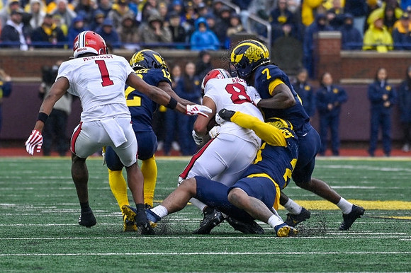 Josh Wallace (12), Makari Paige (7), and Junior Colson (25)