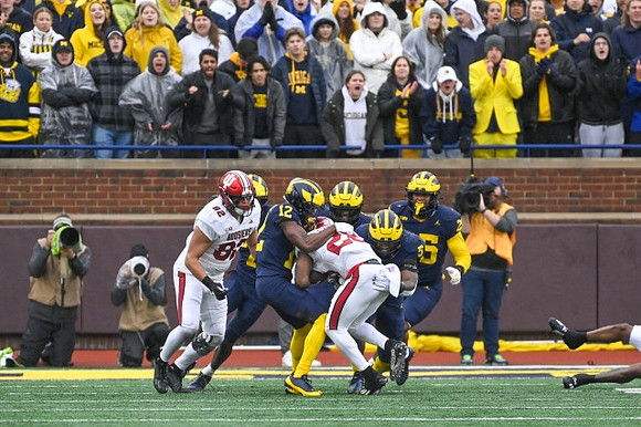 Josh Wallace (12) and Junior Colson (25)
