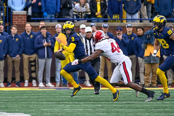 J.J. McCarthy (9) and AJ Barner (89)