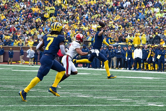 Donovan Edwards (7) and J.J. McCarthy (9)