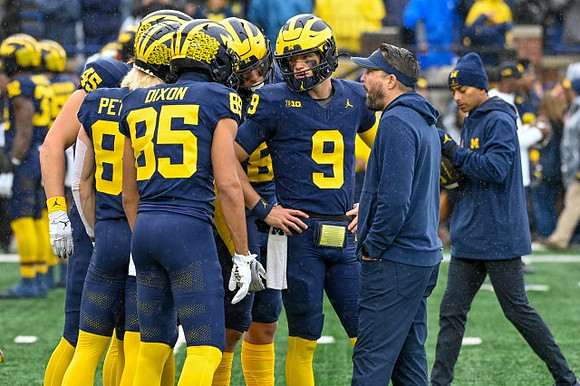 Noah Howes (45), Zach Peterson (86), Cristian Dixon (85), and J.J. McCarthy (9)