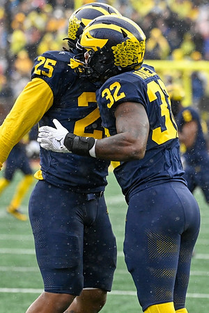 Junior Colson (25) and Jaylen Harrell (32)
