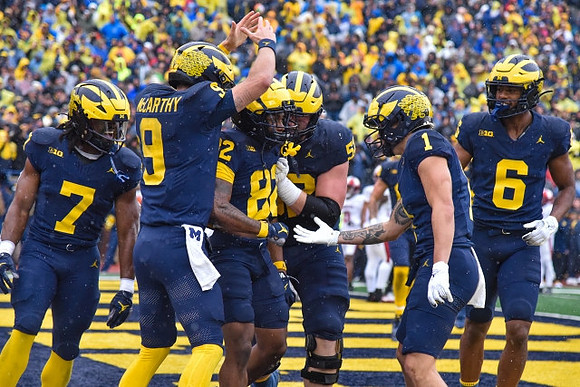 Donovan Edwards (7), J.J. McCarthy (9), Semaj Morgan (82), Karsen Barnhart (52), Roman Wilson (1), and Cornelius Johnson (6)