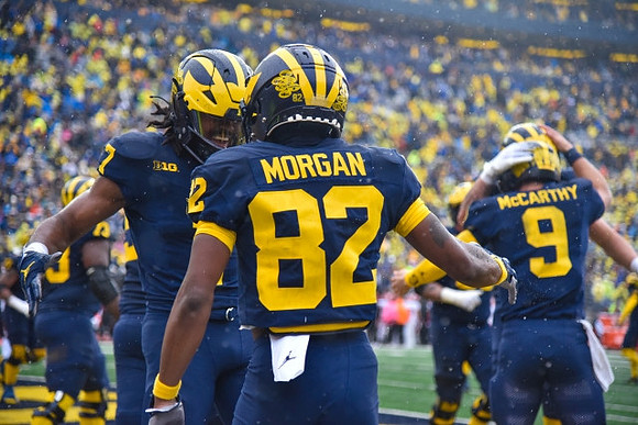 Donovan Edwards (7), Semaj Morgan (82), and J.J. McCarthy (9)
