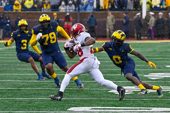 Keon Sabb (3), Kenneth Grant (78), and Mike Sainristil (0)