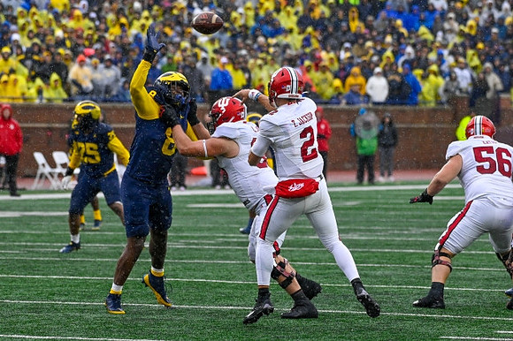 Junior Colson (25) and Derrick Moore (8)
