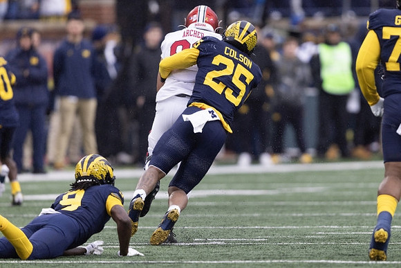 Rod Moore (9) and Junior Colson (25)