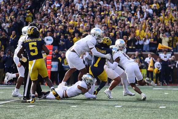 C.J. Charleston (5) and Donovan Edwards (7)