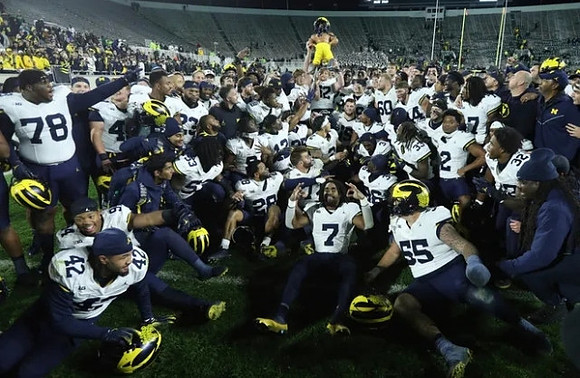 Michigan Team and Paul Bunyan Trophy