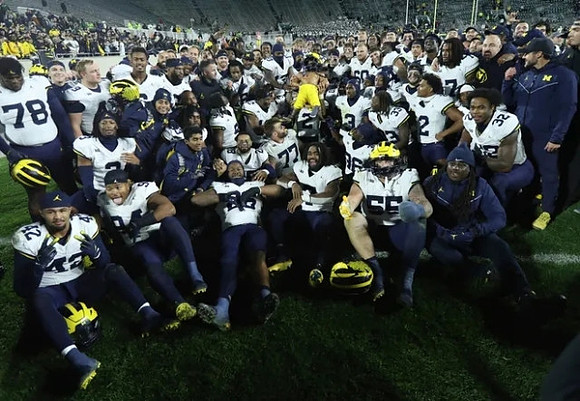 Michigan Team and Paul Bunyan Trophy