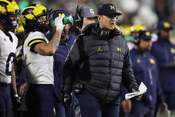 Mike Sainristil (0), Roman Wilson (1), and Jim Harbaugh