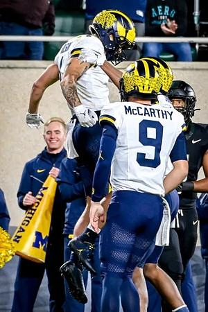 Roman Wilson (1) and J.J. McCarthy (9)