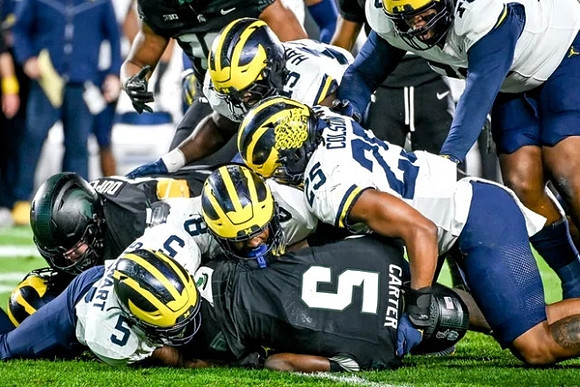 Josaiah Stewart (5), Derrick Moore (8), Ernest Hausmann (15), and Junior Colson (25)