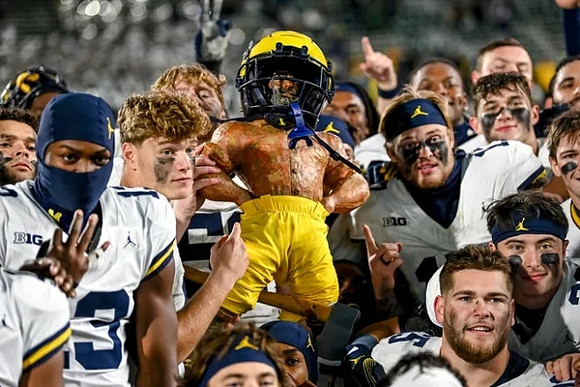 Michigan Team and Paul Bunyan Trophy