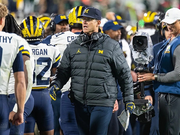 Jim Harbaugh and Michigan Team