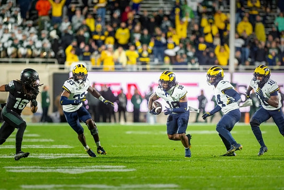 Joey Klunder (93), Ja'Den McBurrows (18), Jaydon Hood (34), and Zeke Berry (10)