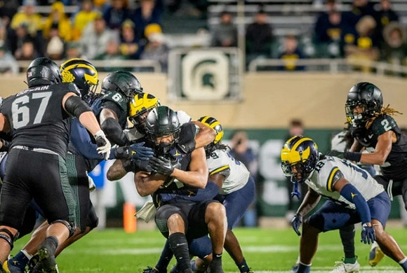 Rod Moore (9) and Ja'Den McBurrows (18)