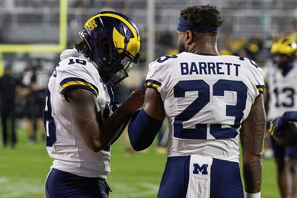 Ja'Den McBurrows (18) and Michael Barrett (23)