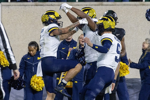 Roman Wilson (1), Cornelius Johnson (6), and J.J. McCarthy (9)