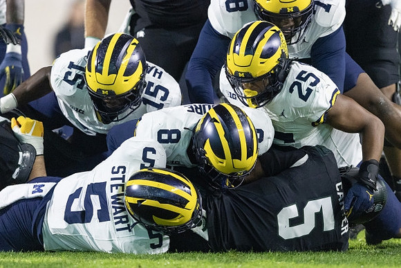 Josaiah Stewart (5), Ernest Hausmann (15), Derrick Moore (8), Junior Colson (25), and Kenneth Grant (78)