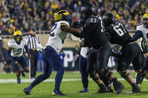 Keon Sabb (3) and Jaylen Harrell (32)