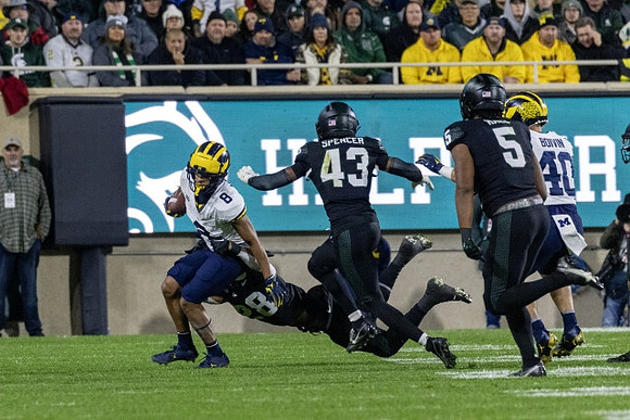 Tyler Morris (8) and Christian Boivin (40)