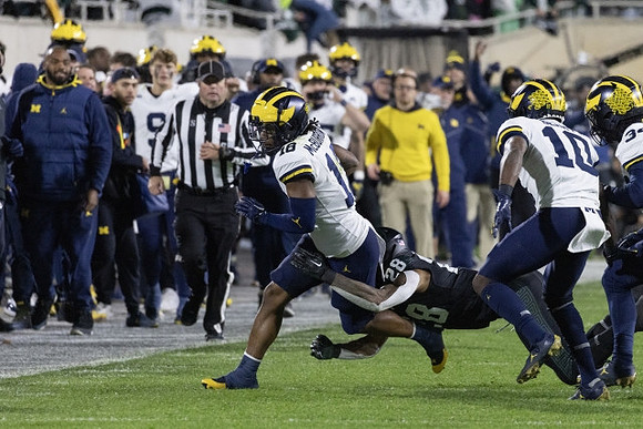 Ja'Den McBurrows (18), Zeke Berry (10), and Jaydon Hood (34)