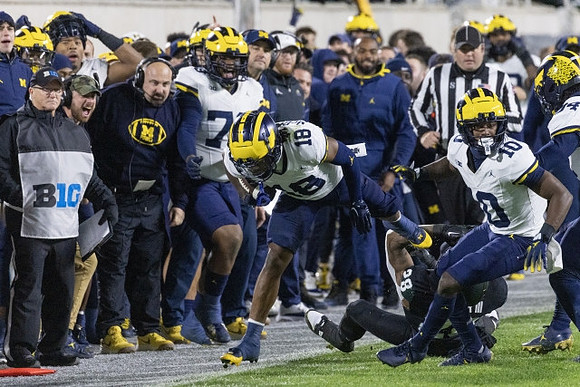 Ja'Den McBurrows (18), Zeke Berry (10), and Jaydon Hood (34)
